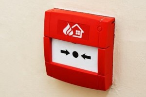 Fire alarm button on wall